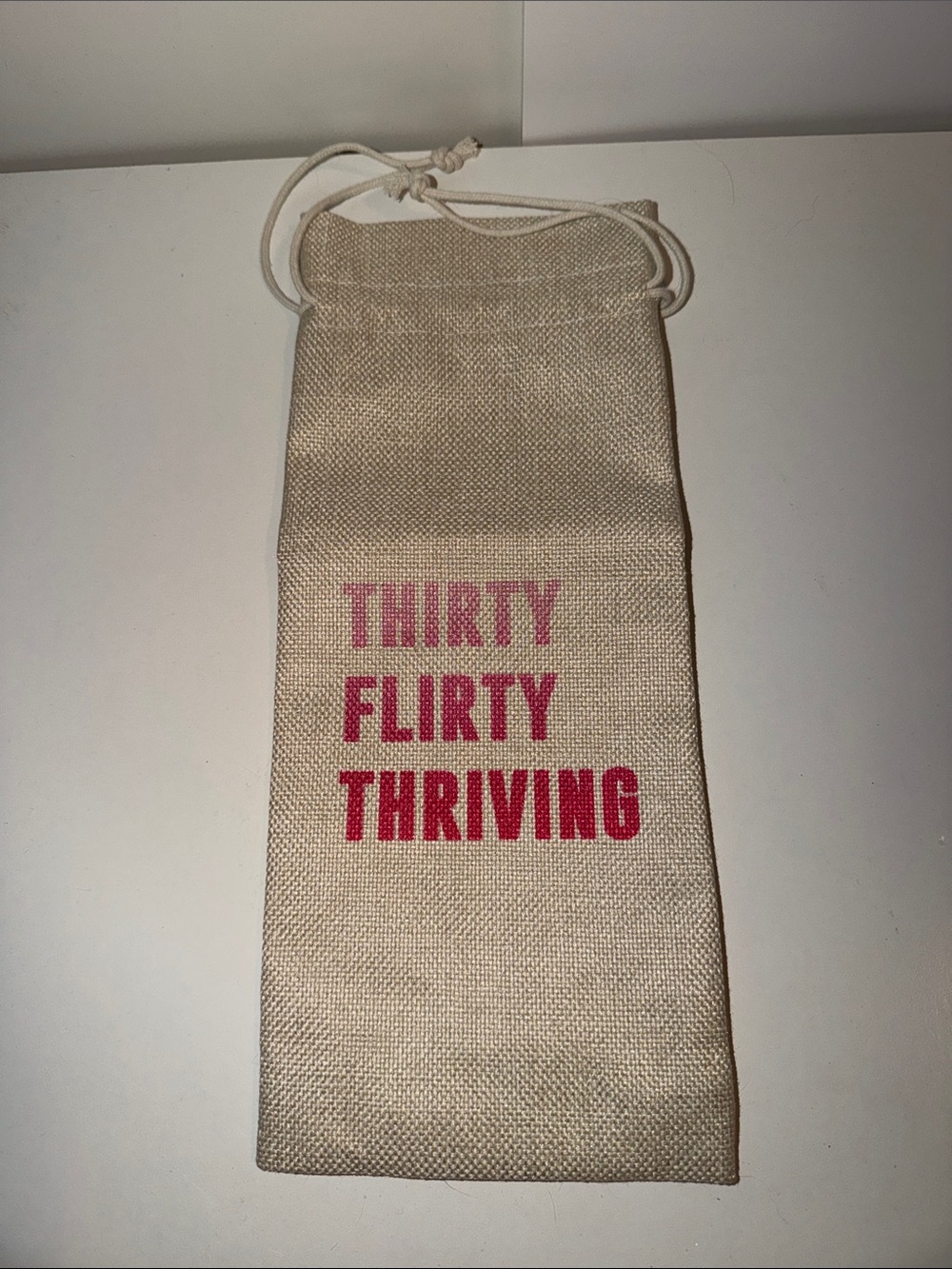 Hobby Lobby Beige Drawstring Pouch with Pink Lettering